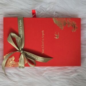 Van Cleef & Arpels Red Box with Gold Accents